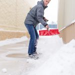 man shoveling snow