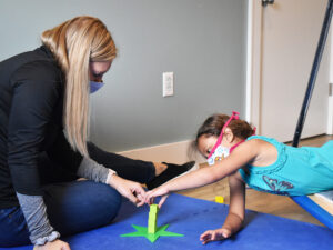 therapist working with child